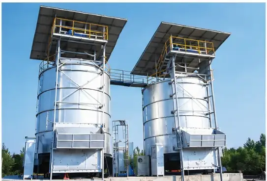 Two vertical fermenter tanks installed on site